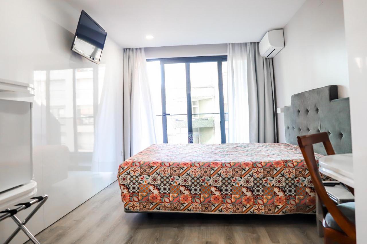 Hotel Avenida โปโว เดอ วาร์ซิม ภายนอก รูปภาพ