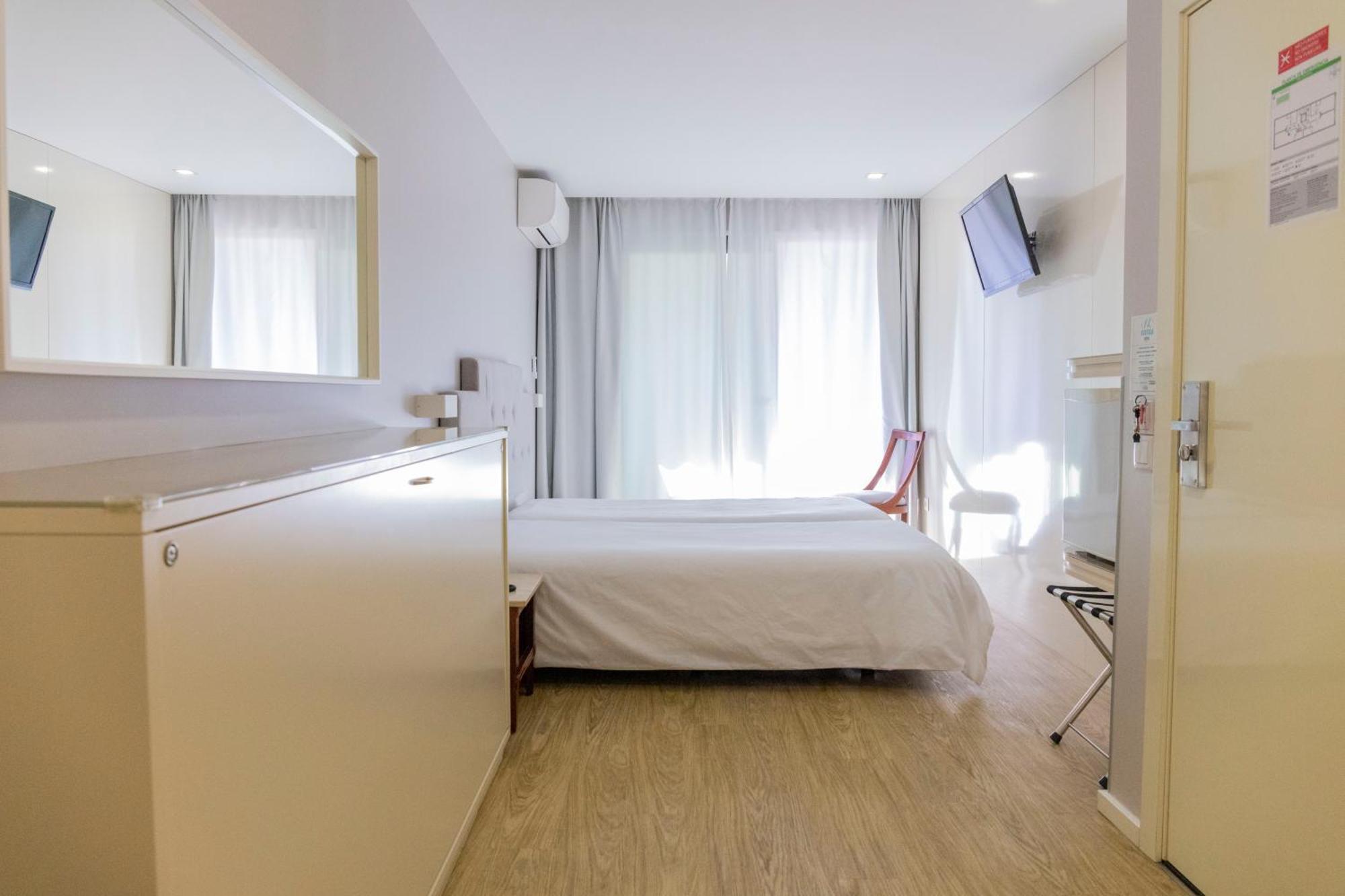 Hotel Avenida โปโว เดอ วาร์ซิม ภายนอก รูปภาพ